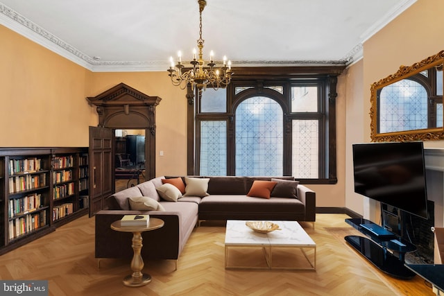 living room featuring light parquet floors, an inviting chandelier, and crown molding