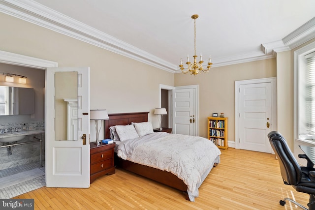 bedroom with a chandelier, ornamental molding, and light hardwood / wood-style flooring