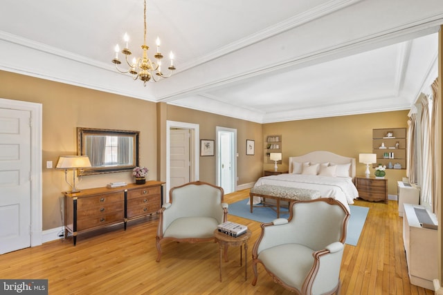 bedroom featuring a chandelier, ornamental molding, and light hardwood / wood-style flooring