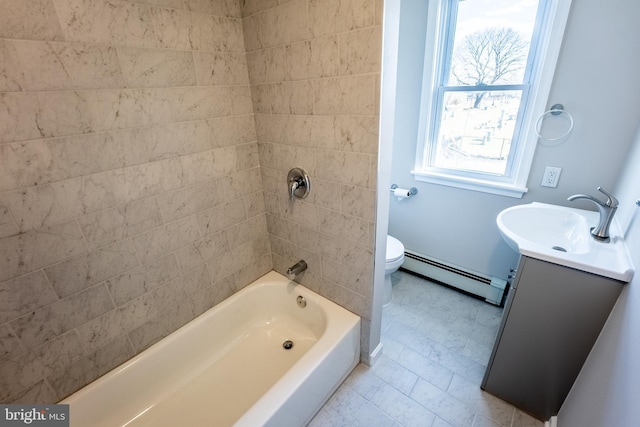 full bathroom featuring toilet, vanity, washtub / shower combination, and a baseboard radiator