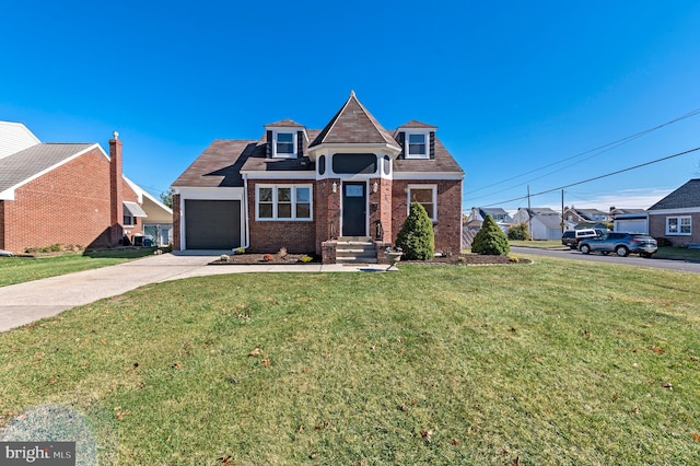 view of front of house featuring a garage and a front lawn