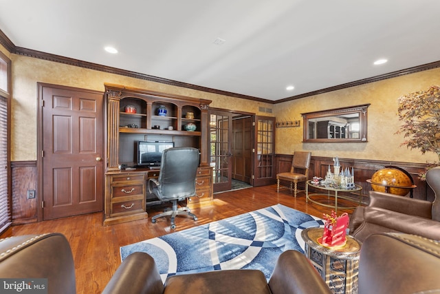 office space featuring crown molding and hardwood / wood-style flooring