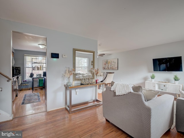 9321 Linhurst Dr, Clinton, MD 20735 - living room with wood finished floors and ceiling fan