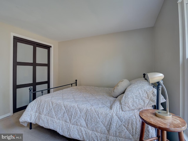bedroom with light carpet