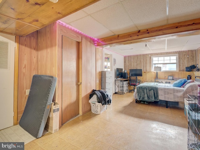 9321 Linhurst Dr, Clinton, MD 20735 - bedroom with wood walls and tile patterned floors