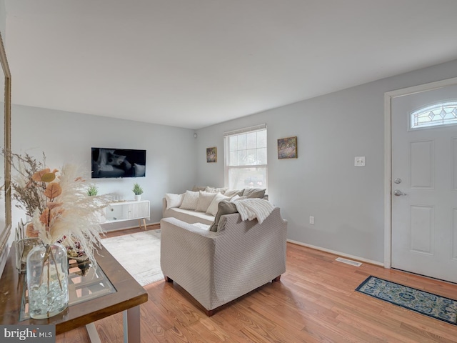 9321 Linhurst Dr, Clinton, MD 20735 - living area featuring light wood-style flooring and baseboards