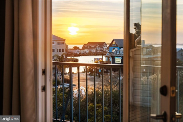 view of balcony at dusk