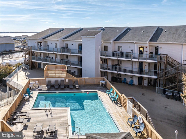 view of swimming pool with a patio