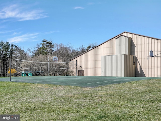 view of outdoor structure featuring a lawn