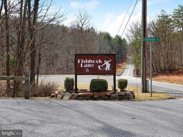 view of community sign