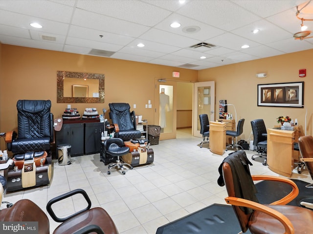 home office with a drop ceiling