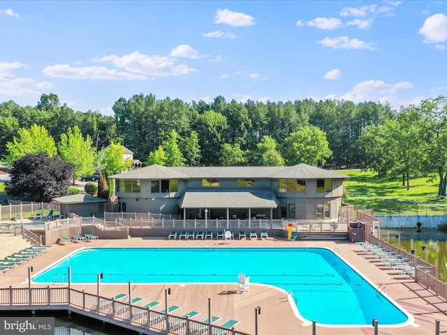 view of swimming pool with a patio