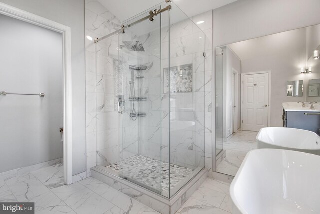 bathroom featuring shower with separate bathtub and vanity