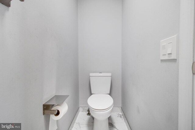 bathroom featuring toilet