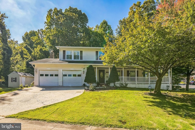 view of front facade with a storage shed, a porch, and a front lawn