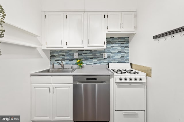 kitchen featuring white stove, stainless steel dishwasher, and white cabinets