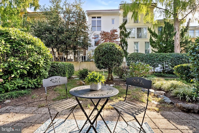 view of patio with a balcony