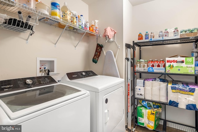 laundry area with washing machine and dryer