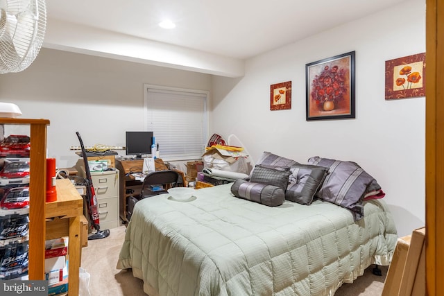 bedroom featuring light carpet