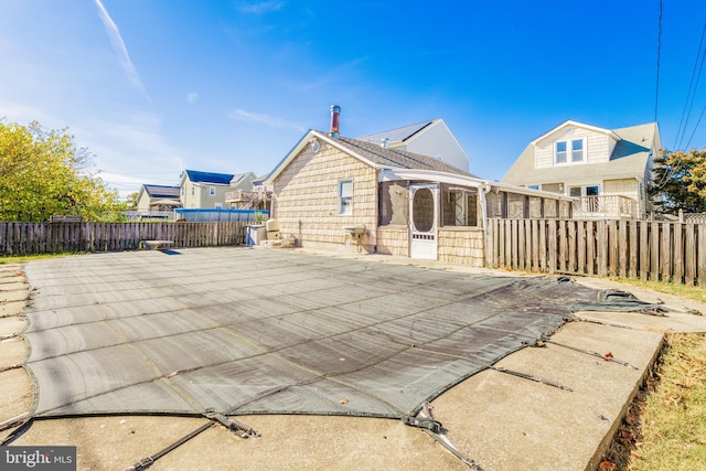 back of house featuring a patio