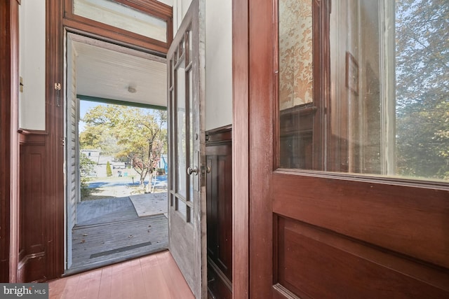 entryway featuring french doors and light wood-type flooring