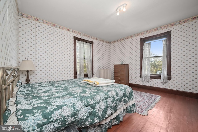 bedroom featuring hardwood / wood-style floors