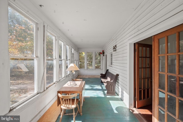 sunroom / solarium featuring a wealth of natural light