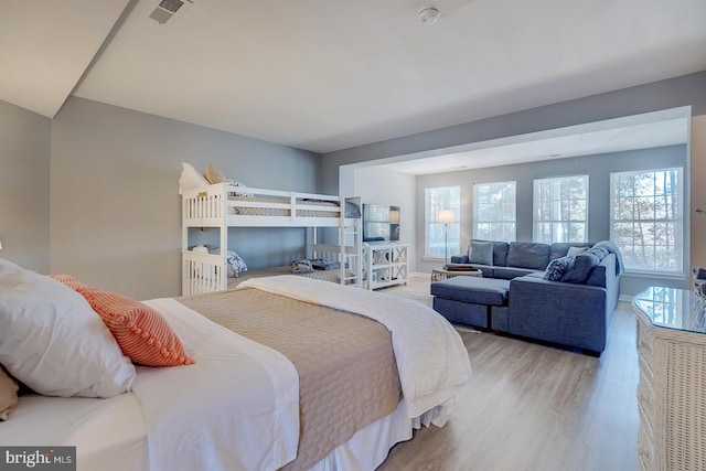 bedroom with light hardwood / wood-style floors