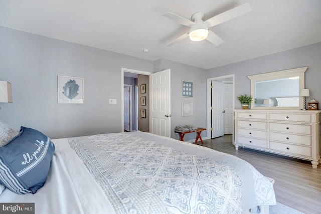 bedroom featuring ceiling fan and hardwood / wood-style floors