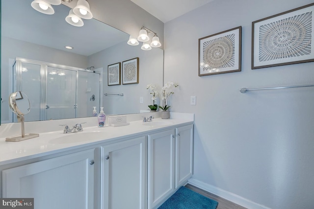 bathroom with vanity and walk in shower