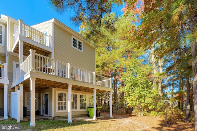 rear view of house with a deck