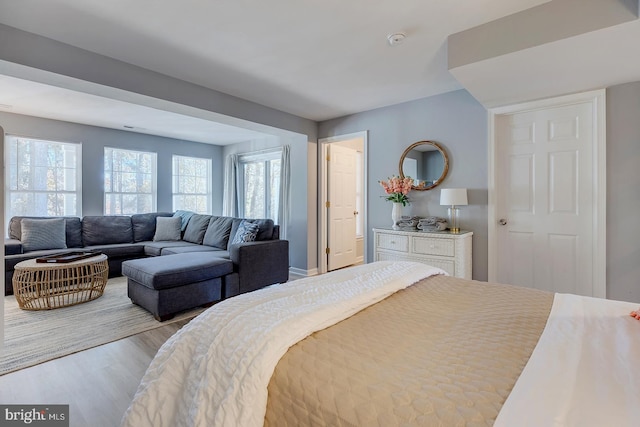 bedroom featuring light wood-type flooring