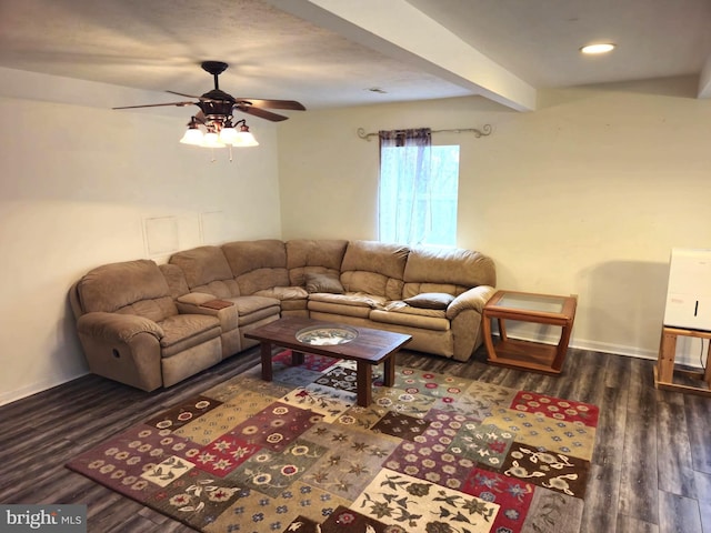 living area with ceiling fan, beamed ceiling, baseboards, and wood finished floors