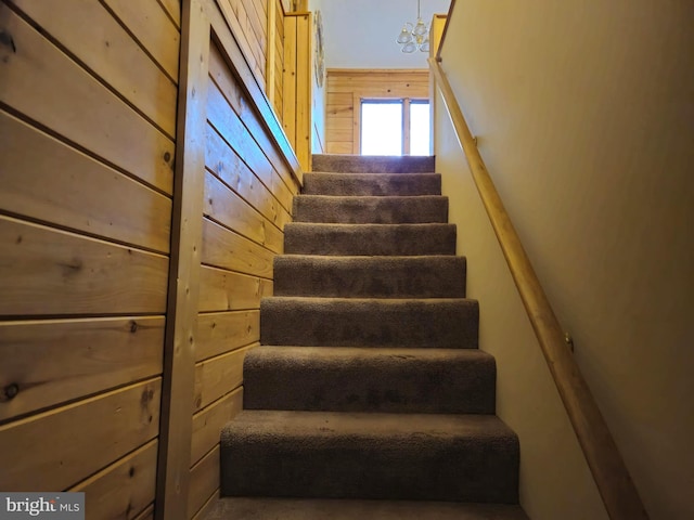 stairway with wooden walls