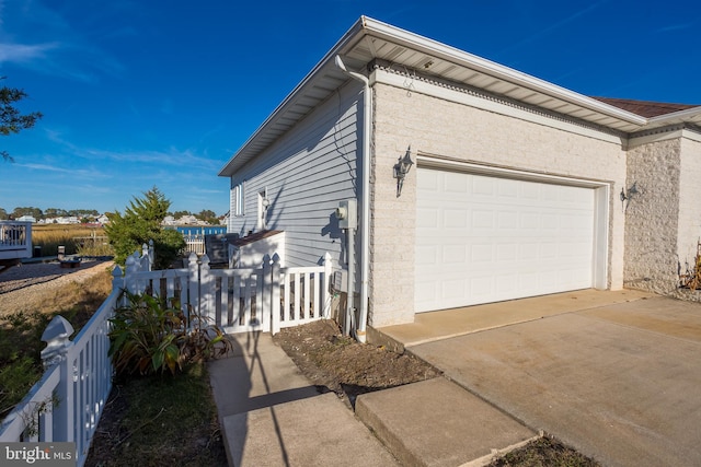 view of home's exterior featuring a garage