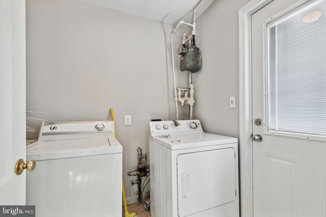 laundry area with washer and clothes dryer