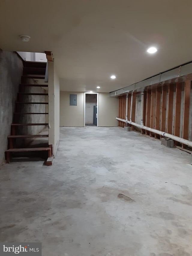 basement featuring electric panel