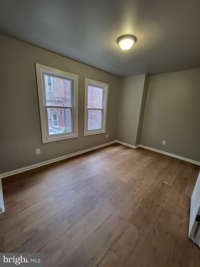 unfurnished room featuring light wood-type flooring