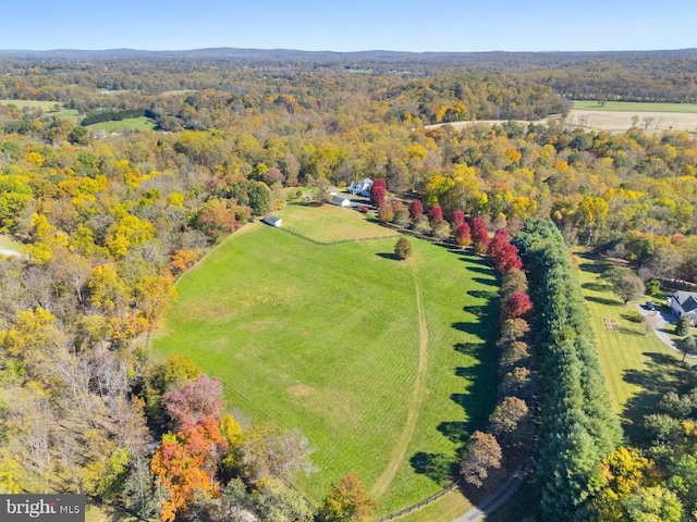 birds eye view of property featuring a rural view