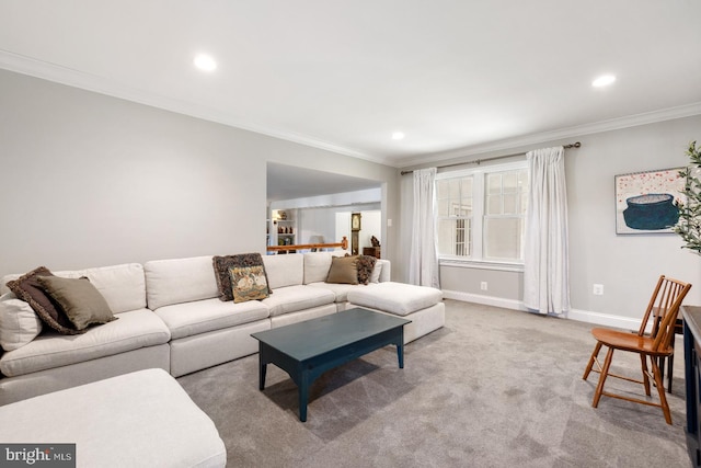 carpeted living room featuring ornamental molding