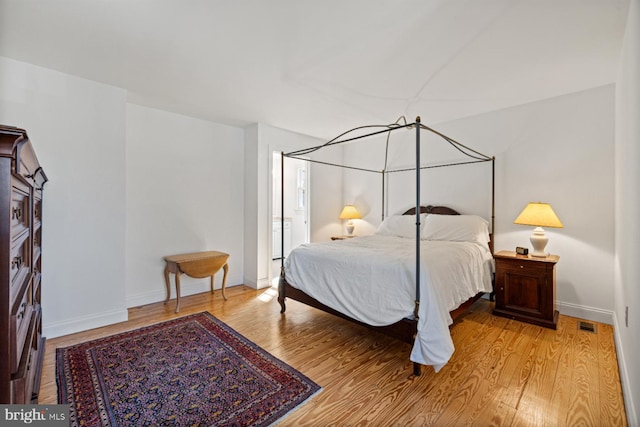 bedroom featuring light wood-type flooring