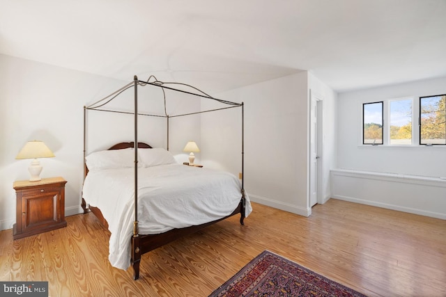 bedroom with light wood-type flooring