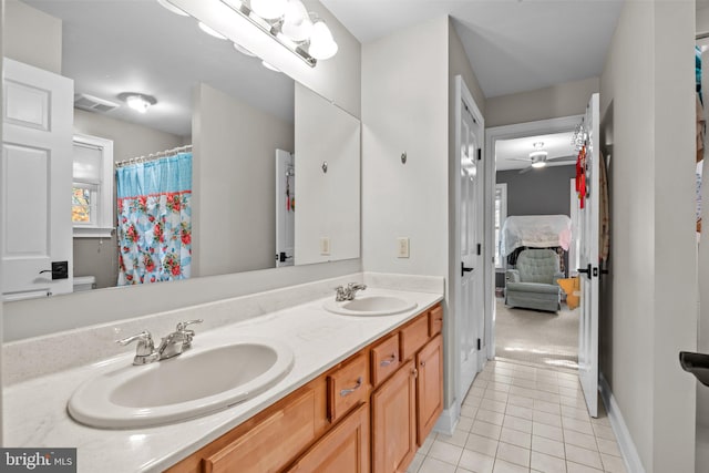 bathroom with vanity, tile patterned floors, and ceiling fan