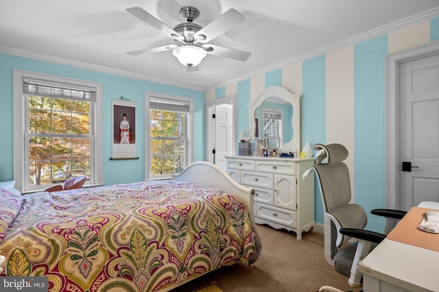 bedroom featuring multiple windows, crown molding, and ceiling fan