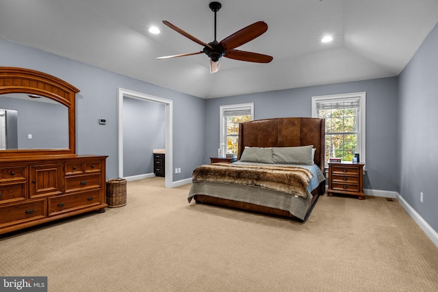 carpeted bedroom with lofted ceiling and ceiling fan