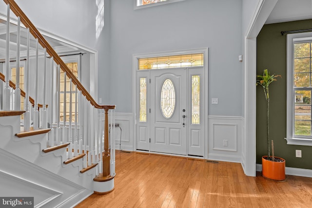 entryway featuring light hardwood / wood-style floors and a wealth of natural light