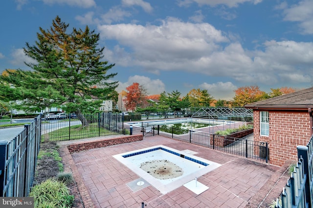 view of patio with a community pool