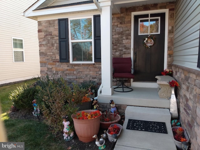 property entrance featuring a porch