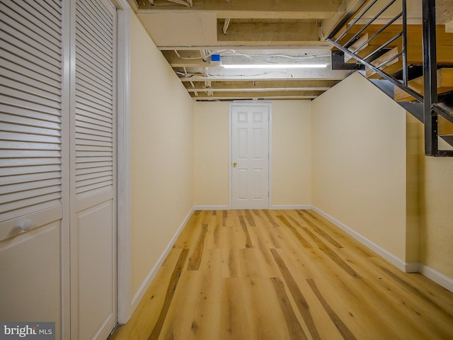 basement featuring hardwood / wood-style flooring