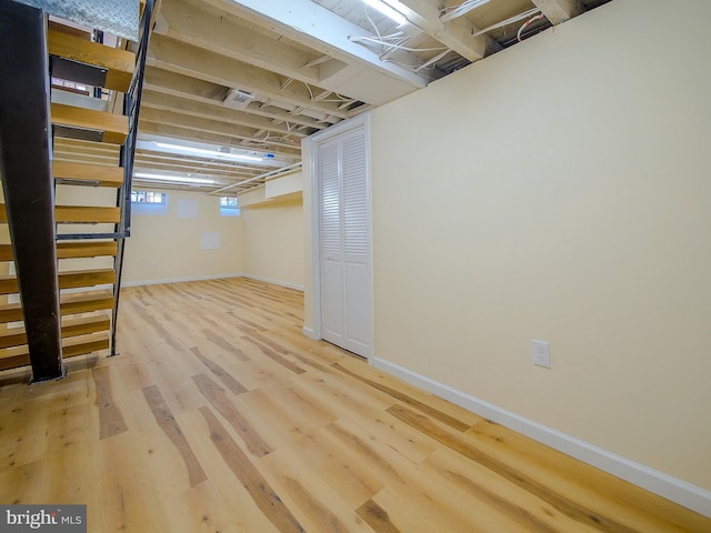 basement with wood-type flooring